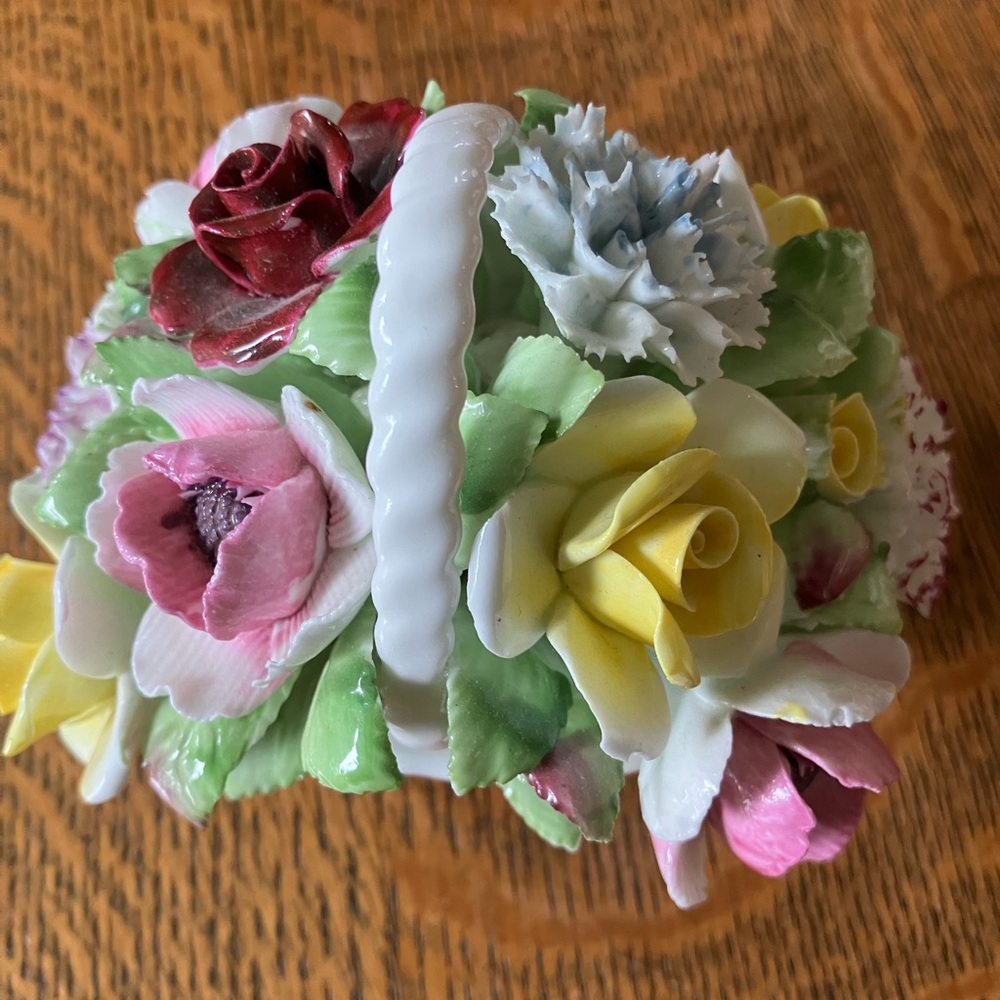 ROYAL DALTON PORCELAIN BASKET OF   ELEVEN HAND MADE FLOWERS IN ENGLAND